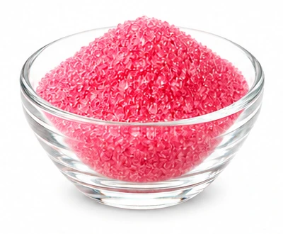 Glass bowl of strawberry pink sugar crystals